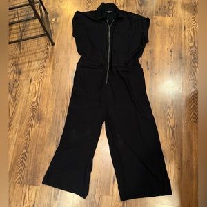 Women’s black short sleeve zipper jumpsuit